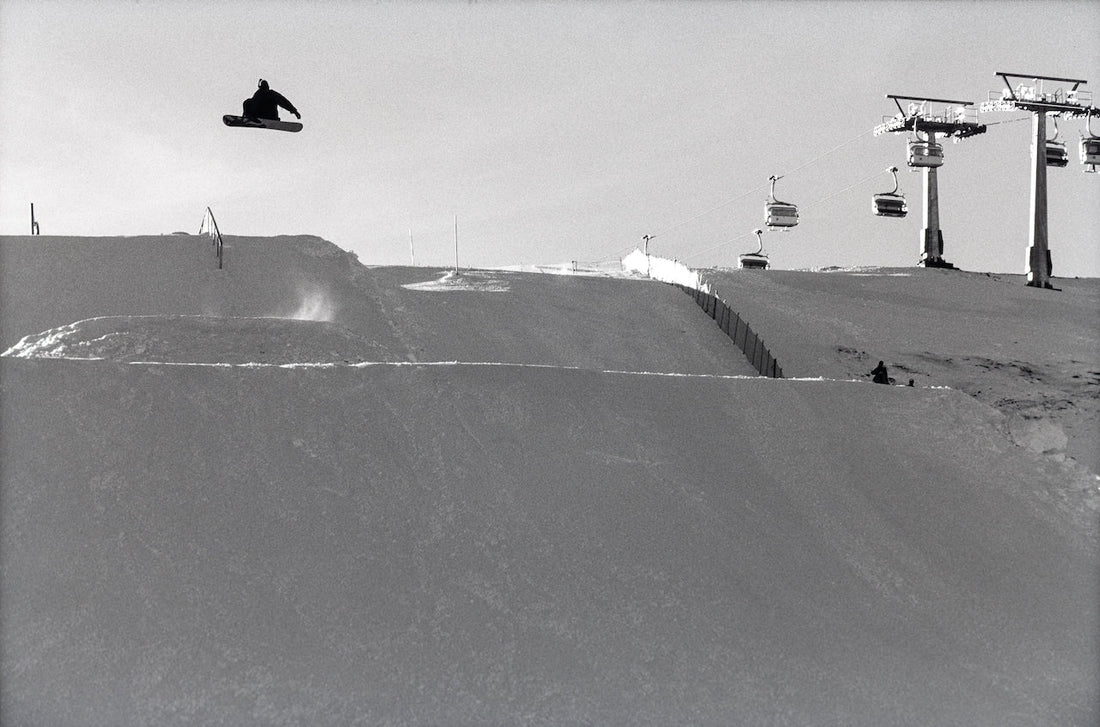 Snowboarder Alessandro Benussi riding the snowboard park in Livigno, Italy