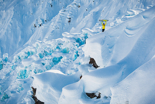 Snowboarder Blair Habenicht signaling that he's ready in Haines Alaska